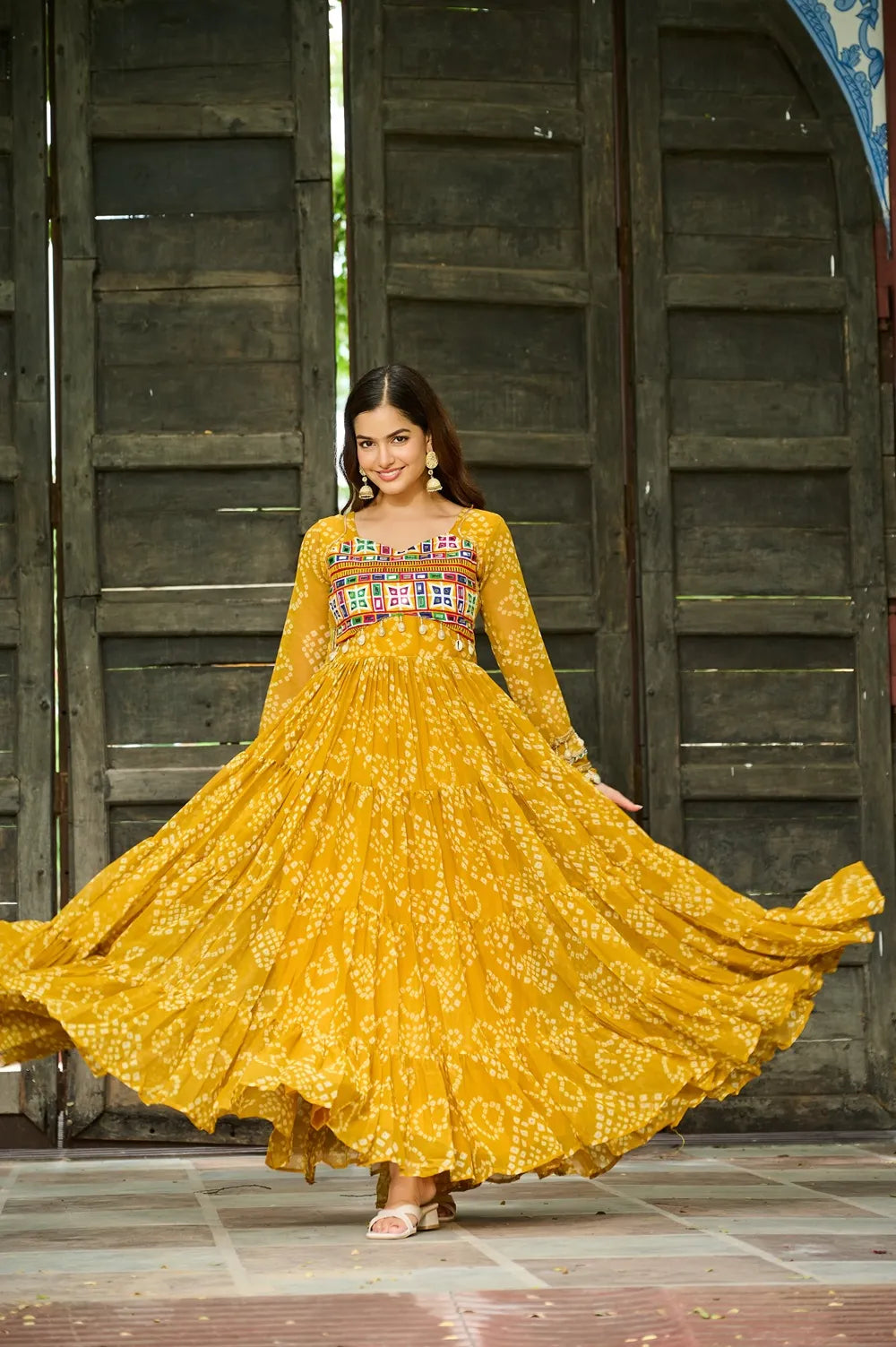 Bandhani Print work with kutchi patchework in Faux Georgette. (Yellow)
